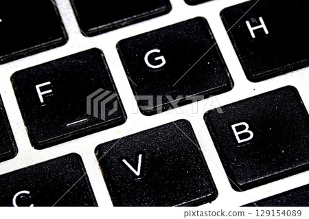 Close up of a laptop heyboard keys  letters and numbers 129154089
