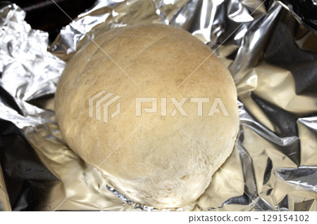 Home made fresh bread roll straight from the oven 129154102