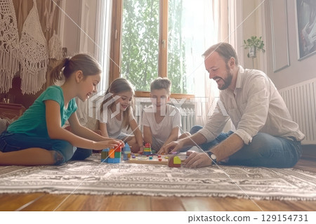 Engaging in Family Bonding Time through Creative Activities and Playful Moments Together 129154731