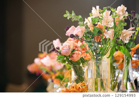 Warm-colored fresh flowers for decorating Takasago and tables Warm-colored fresh flowers for decorating Takasago and tables 129154993