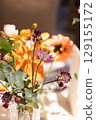 Warm-colored fresh flowers for decorating Takasago and tables 129155172