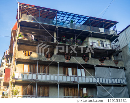Facades of old houses. Facades of houses in Batumi. Asian architecture. Facades of old houses. Facades of houses in Batumi. Asian architecture. 129155281