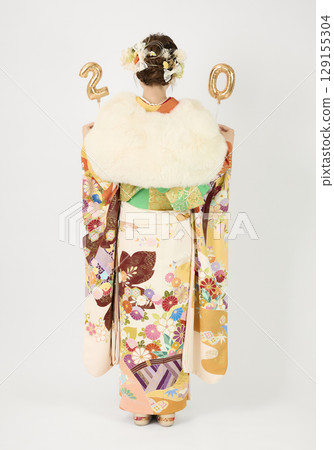 A woman in a kimono 129155304