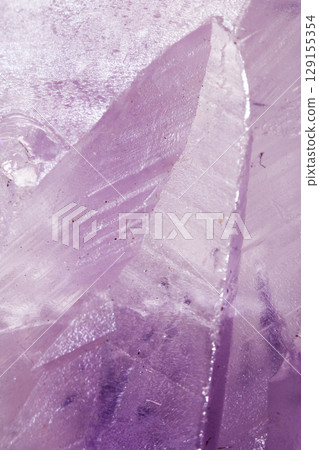 Beautiful close up of quartz crystal rock shard with reflective rainbow spiritual light Beautiful close up of quartz crystal rock shard with reflective rainbow spiritual light 129155354