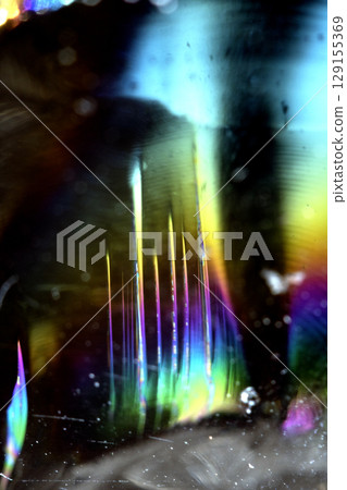 Beautiful close up of quartz crystal rock shard with reflective rainbow Holographic  spiritual light 129155369