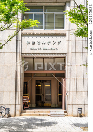 Shinko Building (former Kawasaki Kisen Kaisha headquarters building) main entrance in the former Kobe foreign settlement: a modern Art Deco building 129155628