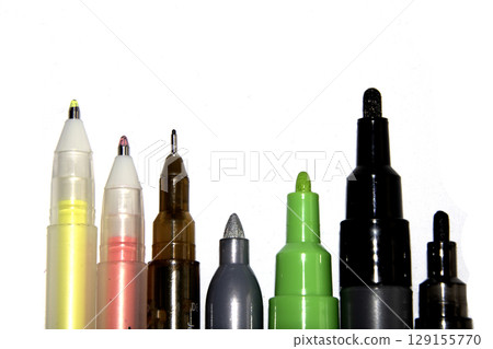 A collection of mixed pens ballpoint and markers close up tips on white background A collection of mixed pens ballpoint and markers close up tips on white background 129155770