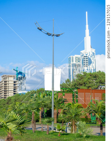 Advertising mockup on a light pole. Resort mockup. Free space for inscription. 129157015