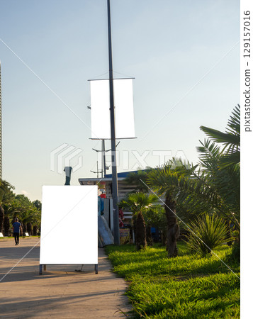 Advertising mockup on a light pole. Resort mockup. Free space for inscription. 129157016