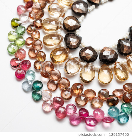 Colorful natural stone beads | Close-up photos of autumn-colored jewelry parts 129157400