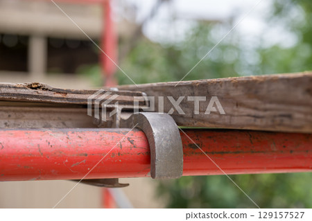 Construction framework displaying scaffolding detail and connection in a building project setting 129157527
