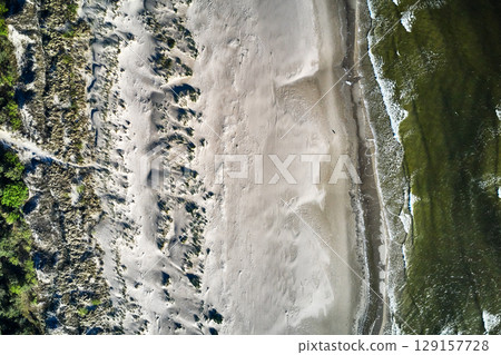 topdown drone view of a baltic sandy beach topdown drone view of a baltic sandy beach 129157728