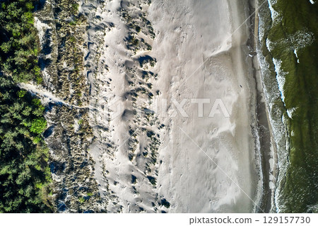 topdown drone view of a baltic sandy beach topdown drone view of a baltic sandy beach 129157730