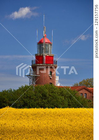Lighthouse Buk near Bastorf in yellow field 129157756