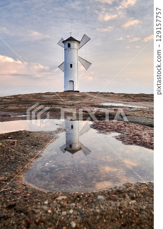 swinoujscie mills lighthouse with reflection swinoujscie mills lighthouse with reflection 129157757
