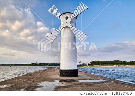 swinoujscie mills lighthouse with reflection 129157799