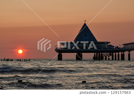 pier of Heringsdorf on German isle of Usedom in sunrise light pier of Heringsdorf on German isle of Usedom in sunrise light 129157863