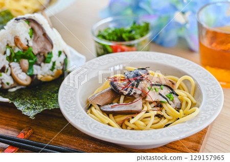 Japanese-style pasta and rice balls made with jumbo shimeji mushrooms Japanese-style pasta and rice balls made with jumbo shimeji mushrooms 129157965