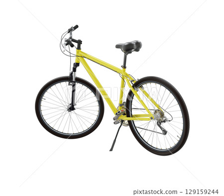 Yellow bicycle standing on kickstand 129159244