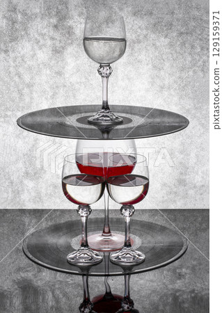 Still life with a glass of red wine with vinyl records 129159371