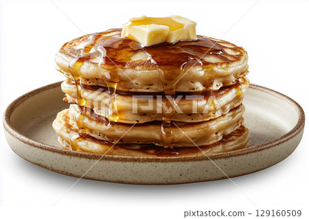 A stack of fluffy pancakes drizzled with syrup and butter, placed on a neutral off-white plate A stack of fluffy pancakes drizzled with syrup and butter, placed on a neutral off-white plate 129160509