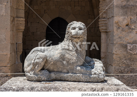 Lion sculpture. Greek elements of architectural decorations of buildings, columns Lion sculpture. Greek elements of architectural decorations of buildings, columns 129161335