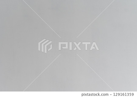 Gray wall surface background for house renovation project. Simple empty texture backdrop for modern design. Minimalist smooth clean slate for calm construction concept 129161359