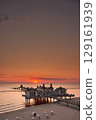 historic Pier of in sunrise mood at baltic sea 129161939