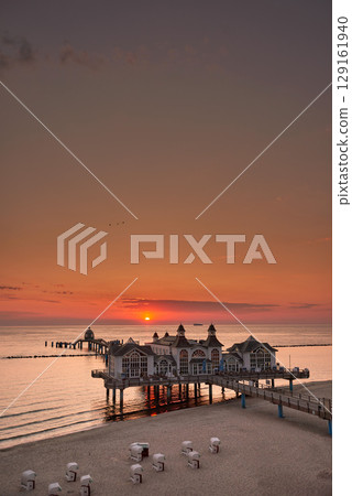 historic Pier of Sellin in sunrise mood at baltic sea historic Pier of Sellin in sunrise mood at baltic sea 129161940