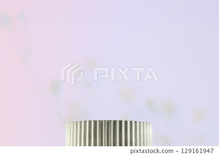 Marble podium on a light gradient background with shadows. Concept scene stage showcase for new product, promotion sale, banner, presentation, cosmetic. Soft image and soft focus style. Front view Marble podium on a light gradient background with shadows. Concept scene stage showcase for new product, promotion sale, banner, presentation, cosmetic. Soft image and soft focus style. Front view 129161947