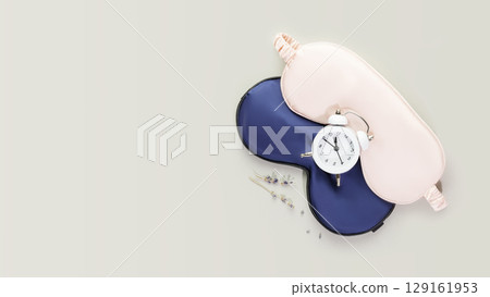 Sleep care composition with masks for sleep, alarm clock with time for sleep and lavender flowers on a grey background. Insomnia or depression treatment for sleepless nights. Mode for good sleep Sleep care composition with masks for sleep, alarm clock with time for sleep and lavender flowers on a grey background. Insomnia or depression treatment for sleepless nights. Mode for good sleep 129161953