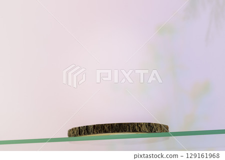 Wooden empty podium on glass shelf on beauty gradient background. Round show case for natural cosmetic products. Concept scene stage for new product, promotion sale and presentation. Low angle Wooden empty podium on glass shelf on beauty gradient background. Round show case for natural cosmetic products. Concept scene stage for new product, promotion sale and presentation. Low angle 129161968