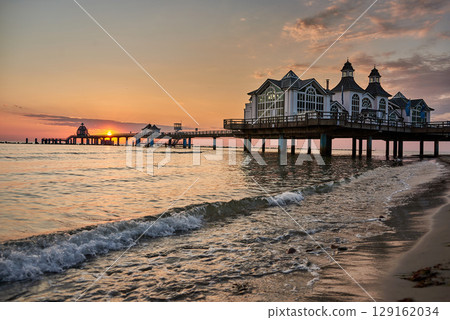 historic Pier of Sellin in sunrise mood at baltic sea 129162034