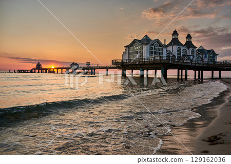 historic Pier of Sellin in sunrise mood at baltic sea historic Pier of Sellin in sunrise mood at baltic sea 129162036