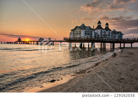 historic Pier of Sellin in sunrise mood at baltic sea historic Pier of Sellin in sunrise mood at baltic sea 129162038