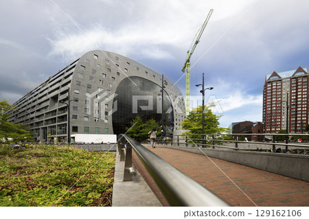 ROTTERDAM, NETHERLANDS. AUGUST 1, 2025. The modern building of the Markthal shopping mall in Rotterdam 129162106