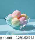 Pastel colorful mochi in a glass bowl. 129162548