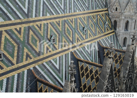 Close-up of the geometric mosaic roof of St. Stephen's Cathedral Close-up of the geometric mosaic roof of St. Stephen's Cathedral 129163019