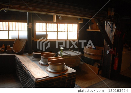 The kitchen is lined with traditional wooden pots and the smell of wood fire wafts through the air. The kitchen is lined with traditional wooden pots and the smell of wood fire wafts through the air. 129163434