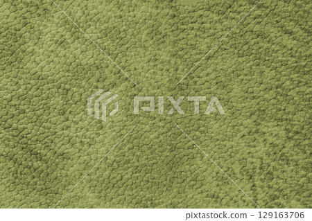 Close up, macro texture of khaki suede, faux leather surface with natural pebble grain pattern 129163706