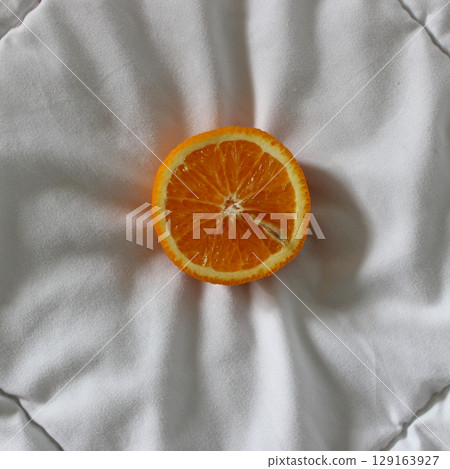 White Fabric And Cutted In Half Orange Fruit On It Detailed Stock Photo 129163927