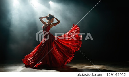 Passionate flamenco dancer in a red dress 129164922