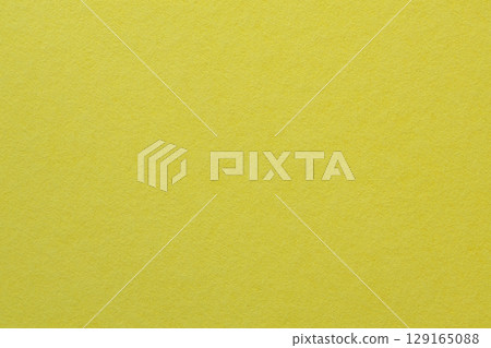Blank Yellow Paper Surface with Natural Material Close-Up 129165088