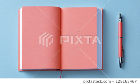 Open Notebook and Pen on Light Blue Background 129165467