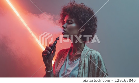 Woman Vaping in Neon Light Setting 129165846
