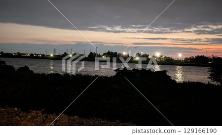 Dusk, near the river mouth 129166190