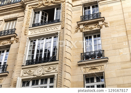 Facade of residential building in Paris, France Facade of residential building in Paris, France 129167817
