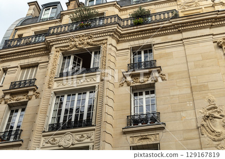 Facade of residential building in Paris, France Facade of residential building in Paris, France 129167819