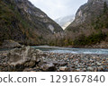 Mountain River with Blue Water in Autumn 129167840