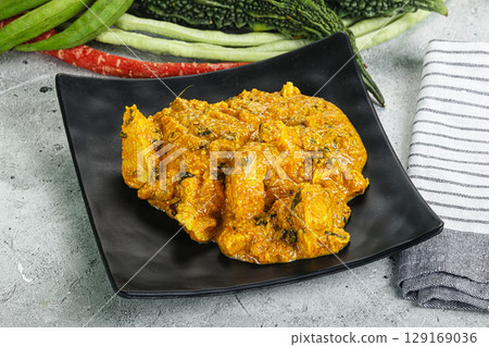 Spicy chicken masala in the bowl Spicy chicken masala in the bowl 129169036